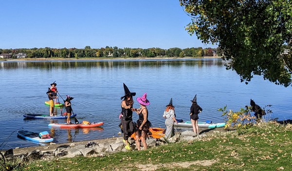 witches on paddleboards